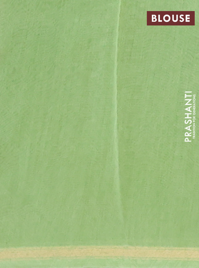 Chanderi silk cotton saree light green and orange with allover prints and zari woven border