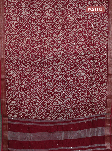 Chanderi silk cotton saree maroon with allover prints & mirror work and banarasi style border
