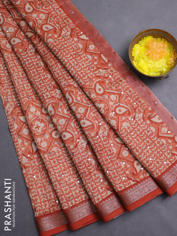 Chanderi silk cotton saree rust shade with allover prints & mirror work and banarasi style border