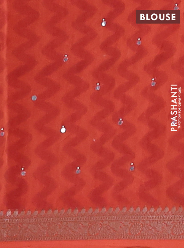 Chanderi silk cotton saree rust shade with allover prints & mirror work and banarasi style border