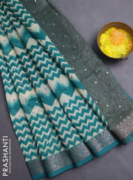 Chanderi silk cotton saree teal green and beige with allover zigzag prints & mirror work and banarasi style border