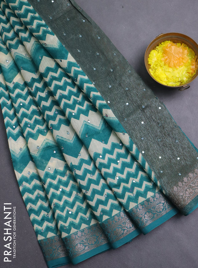 Chanderi silk cotton saree teal green and beige with allover zigzag prints & mirror work and banarasi style border
