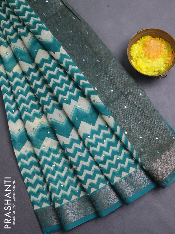 Chanderi silk cotton saree teal green and beige with allover zigzag prints & mirror work and banarasi style border