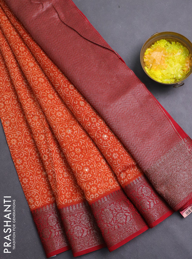 Chanderi silk cotton saree orange and maroon with allover prints & mirror work and banarasi style border