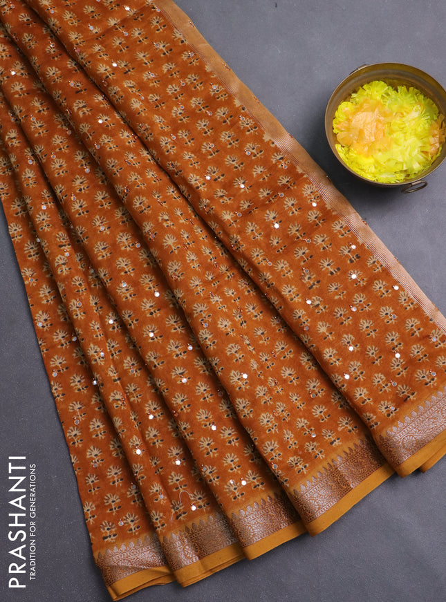 Chanderi silk cotton saree dark mustard with allover prints & mirror work and banarasi style border