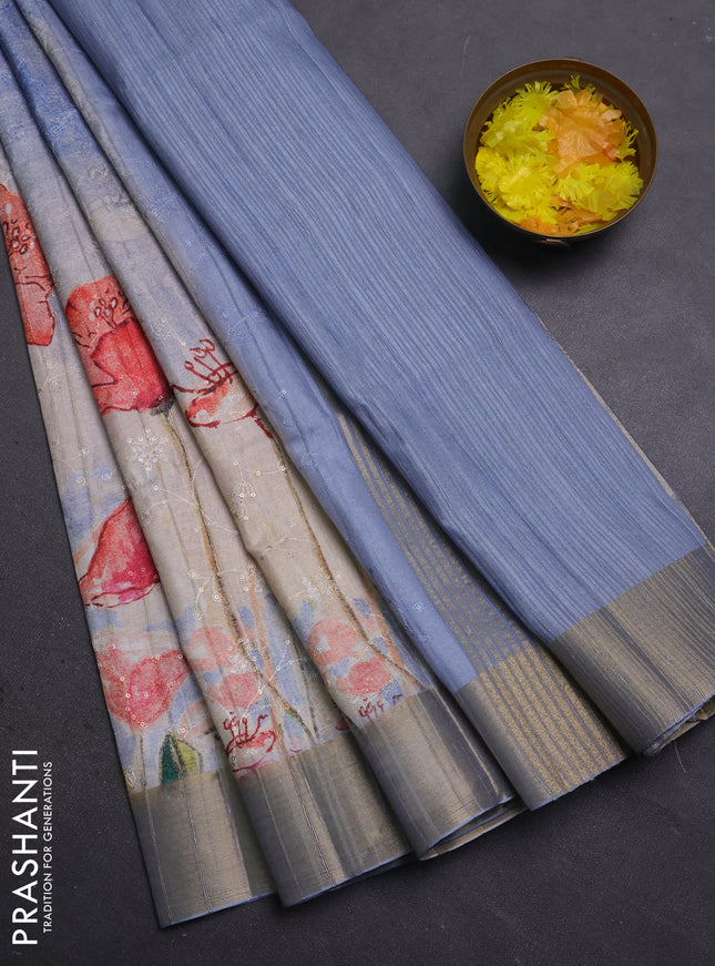 Semi matka saree pasel blue with allover floral prints & sequence work and zari woven border