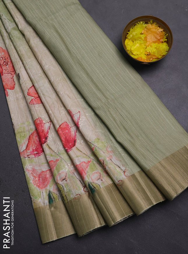 Semi matka saree pista green with allover floral prints & sequence work and zari woven border