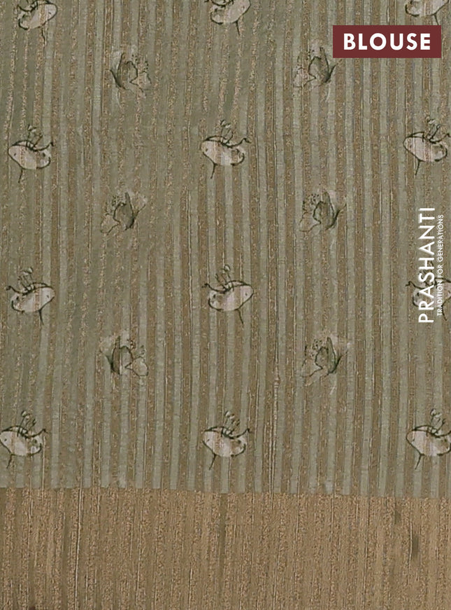 Semi matka saree pista green with allover floral prints & sequence work and zari woven border