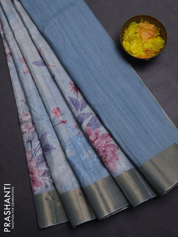 Semi matka saree pastel blue with allover floral prints & sequence work and zari woven border