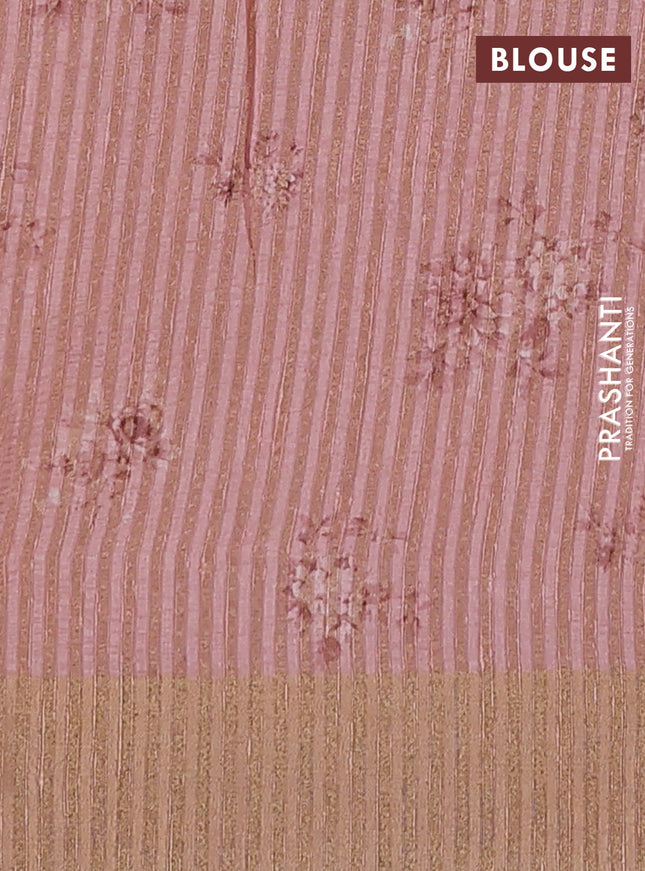 Semi matka saree peach shade with allover floral prints & sequence work and zari woven border