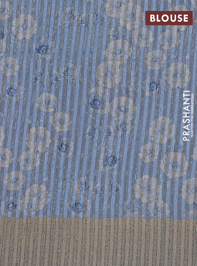 Semi matka saree pastel blue with allover floral prints & sequence work and zari woven border