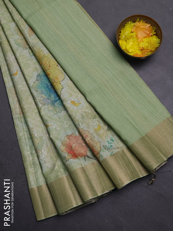 Semi matka saree pista green with allover floral prints & sequence work and zari woven border