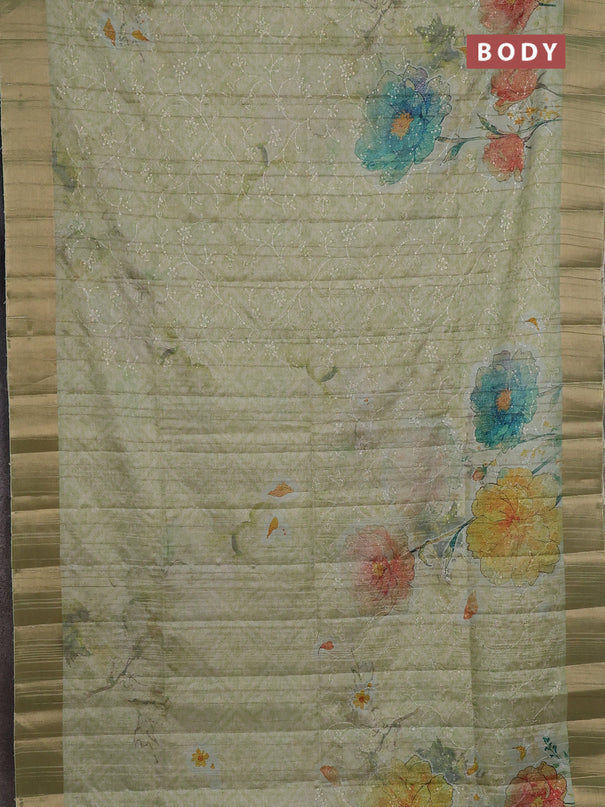 Semi matka saree pista green with allover floral prints & sequence work and zari woven border
