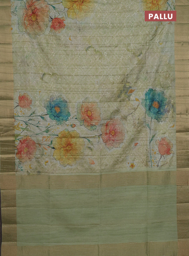 Semi matka saree pista green with allover floral prints & sequence work and zari woven border