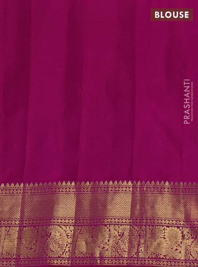 Pure gadwal silk saree green and magenta pink with annam zari woven buttas and temple design zari woven border