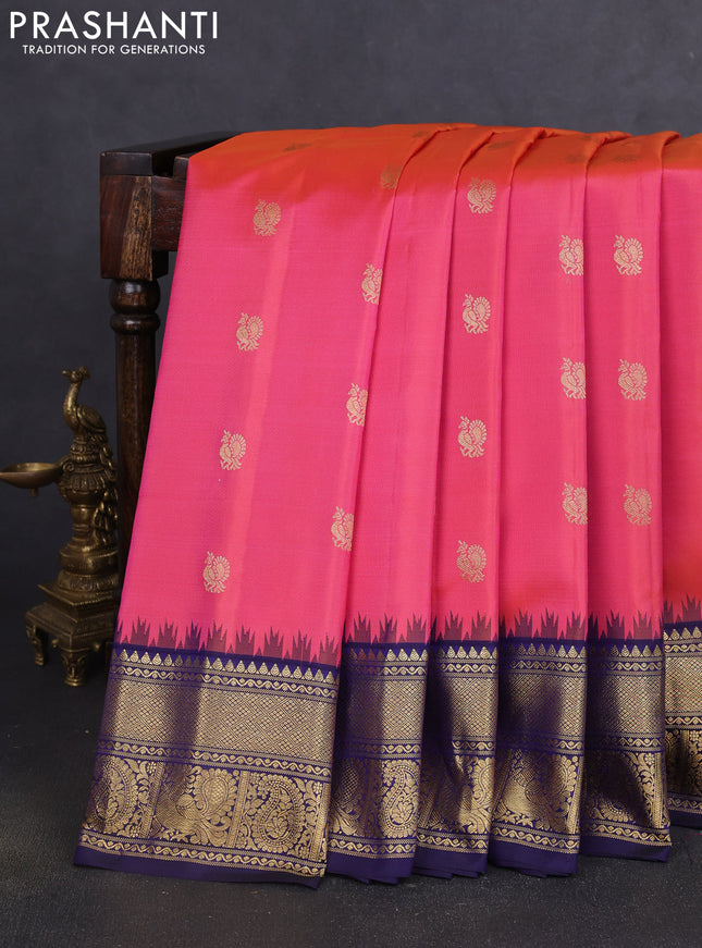 Pure gadwal silk saree dual shade of peach pink and navy blue with annam zari woven buttas and temple design zari woven border