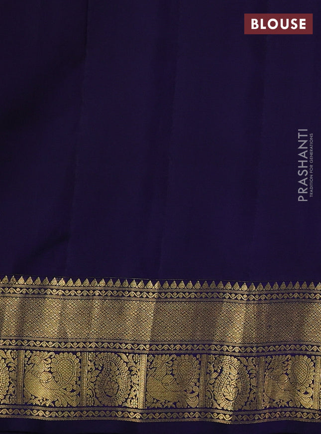 Pure gadwal silk saree dual shade of peach pink and navy blue with annam zari woven buttas and temple design zari woven border