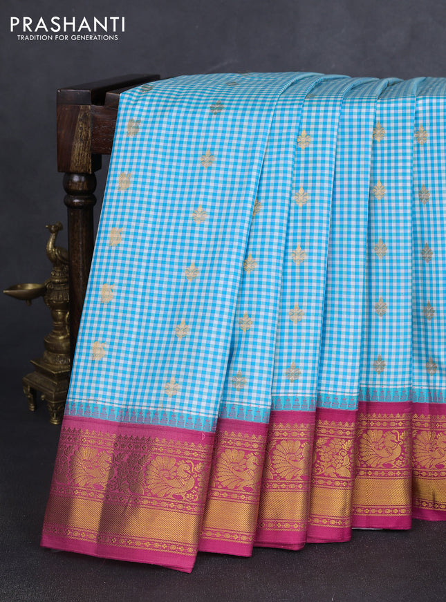 Pure gadwal silk saree off white light blue and pink with allover small checks & zari buttas and temple design zari woven border