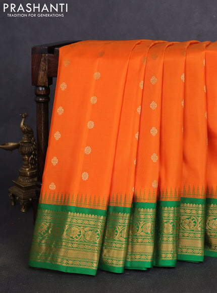 Pure gadwal silk saree orange and green with zari woven buttas and temple design zari woven border