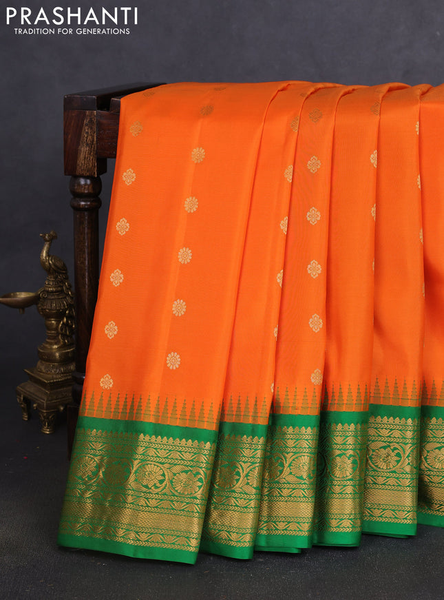 Pure gadwal silk saree orange and green with zari woven buttas and temple design zari woven border