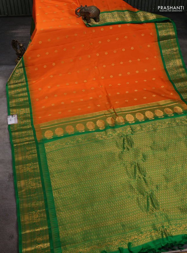 Pure gadwal silk saree orange and green with zari woven buttas and temple design zari woven border