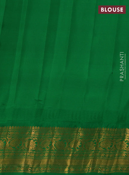 Pure gadwal silk saree orange and green with zari woven buttas and temple design zari woven border