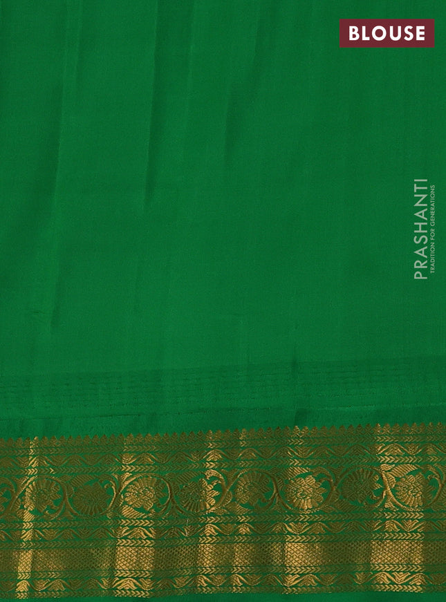 Pure gadwal silk saree mild peach and green with zari woven buttas and temple design zari woven border
