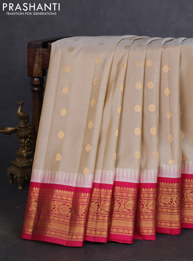 Pure gadwal silk saree beige and pink with allover zari woven buttas and temple design zari woven border