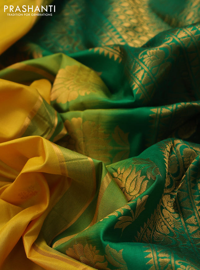 Pure gadwal silk saree yellow and green with allover zari woven buttas and temple design zari woven border