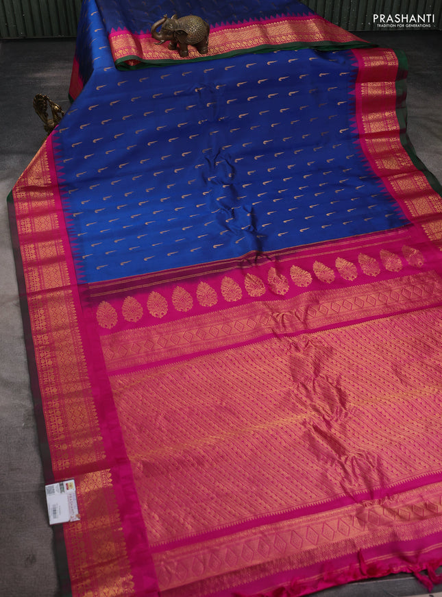 Pure gadwal silk saree peacock blue and pink with zari woven muniya buttas and temple design zari woven border