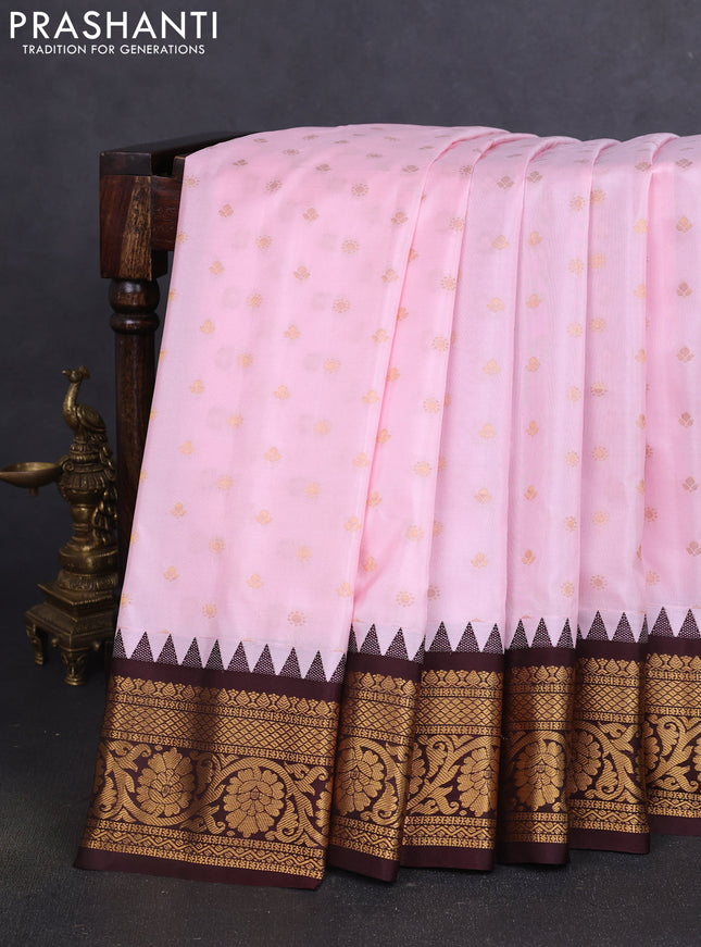Pure gadwal silk saree mild peach pink and coffee brown with allover zari woven buttas and temple design zari woven border