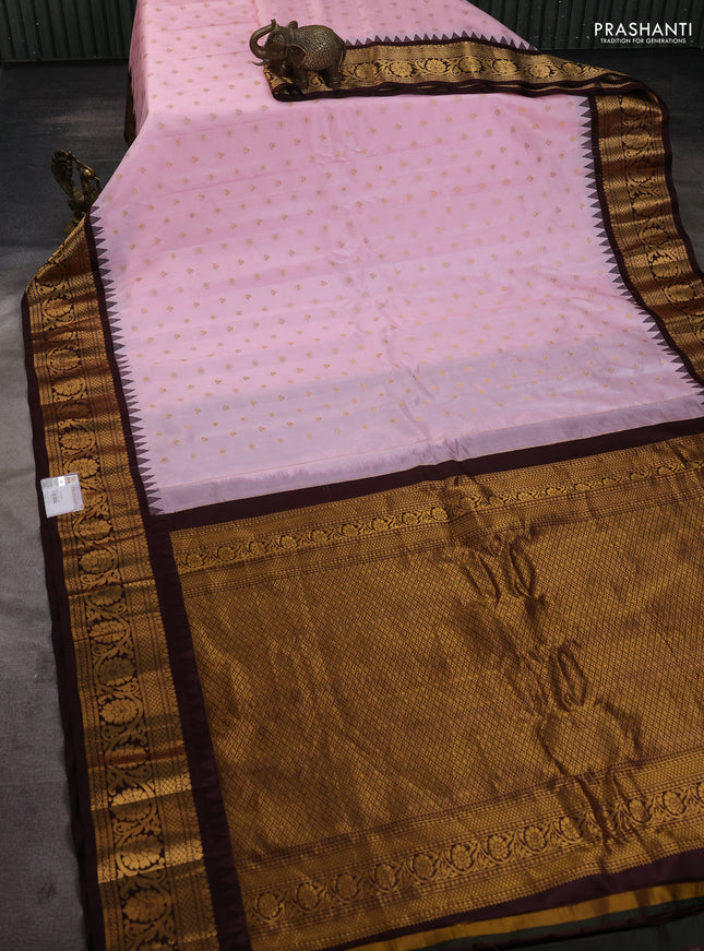 Pure gadwal silk saree mild peach pink and coffee brown with allover zari woven buttas and temple design zari woven border