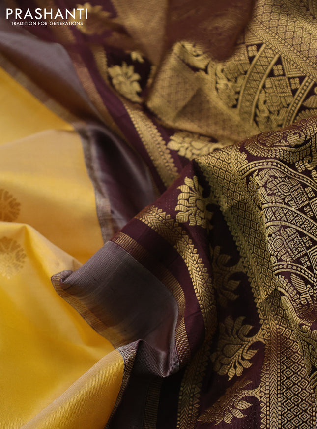 Pure gadwal silk saree yellow shade and coffee brown with zari woven buttas and temple design zari woven border