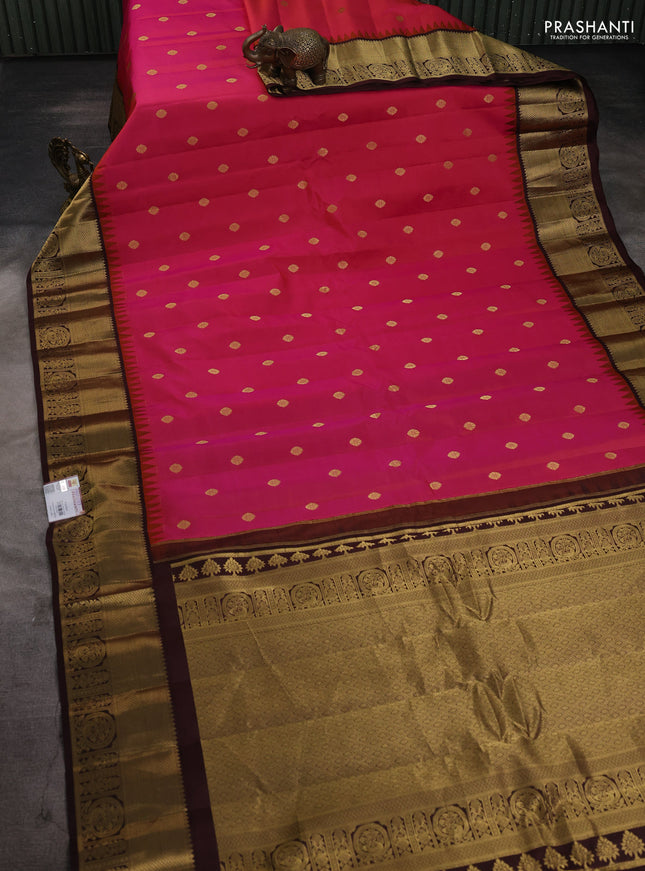 Pure gadwal silk saree dual shade of pink and coffee brown with zari woven buttas and temple design zari woven border