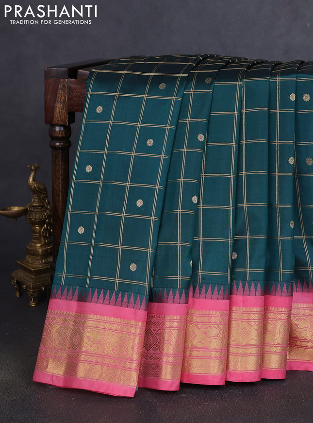 Pure gadwal silk saree peacock green and peach pink with allover zari checks & buttas and temple design zari woven border