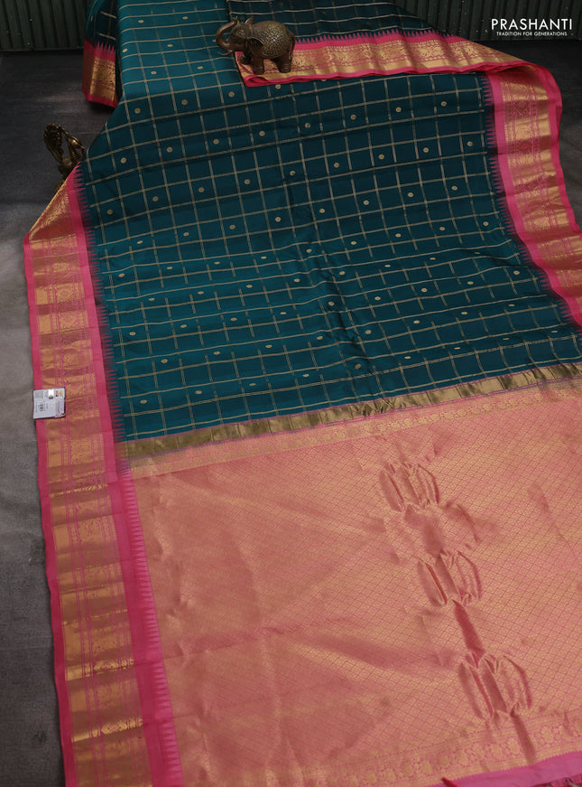Pure gadwal silk saree peacock green and peach pink with allover zari checks & buttas and temple design zari woven border