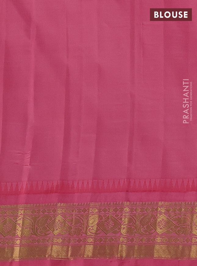 Pure gadwal silk saree peacock green and peach pink with allover zari checks & buttas and temple design zari woven border