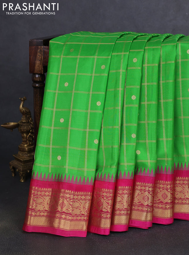 Pure gadwal silk saree parrot green and pink with allover zari checks & buttas and temple design zari woven border