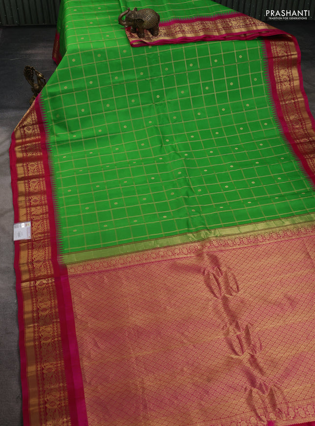 Pure gadwal silk saree parrot green and pink with allover zari checks & buttas and temple design zari woven border