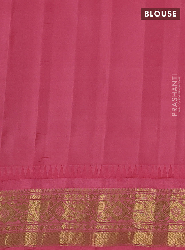 Pure gadwal silk saree parrot green and peach pink with allover zari checks & buttas and temple design zari woven border