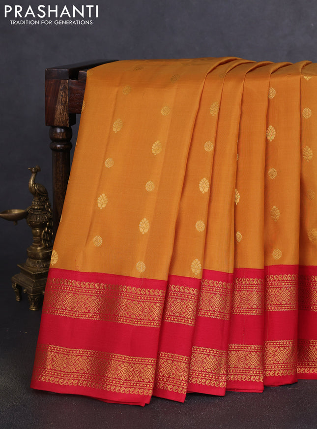Pure gadwal silk saree dark mustard and red with zari woven buttas and rettapet zari woven border
