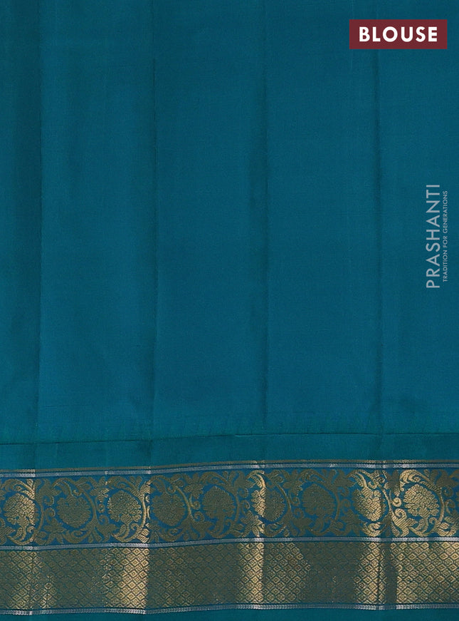 Pure gadwal silk saree dual shade of mustard yellowish pink and teal green with zari woven buttas and temple design zari woven korvai border