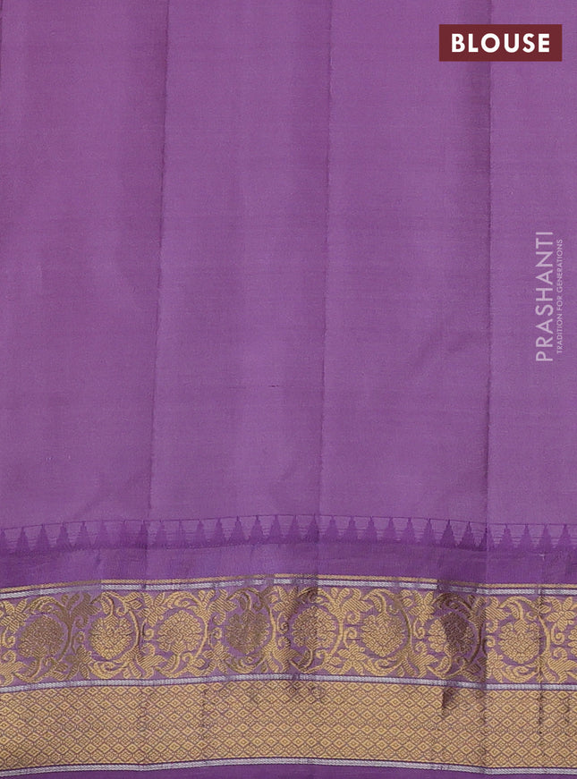 Pure gadwal silk saree pastel green and lavender with zari woven buttas and temple design zari woven korvai border