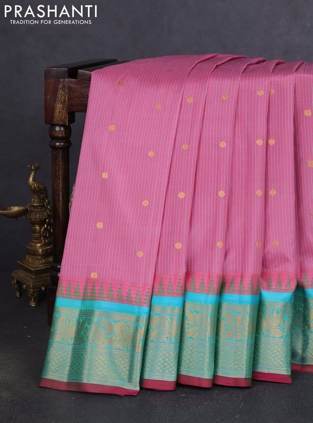 Pure gadwal silk saree peach pink shade and dual shade of teal bluish green with allover checks & zari buttas and temple design zari woven border