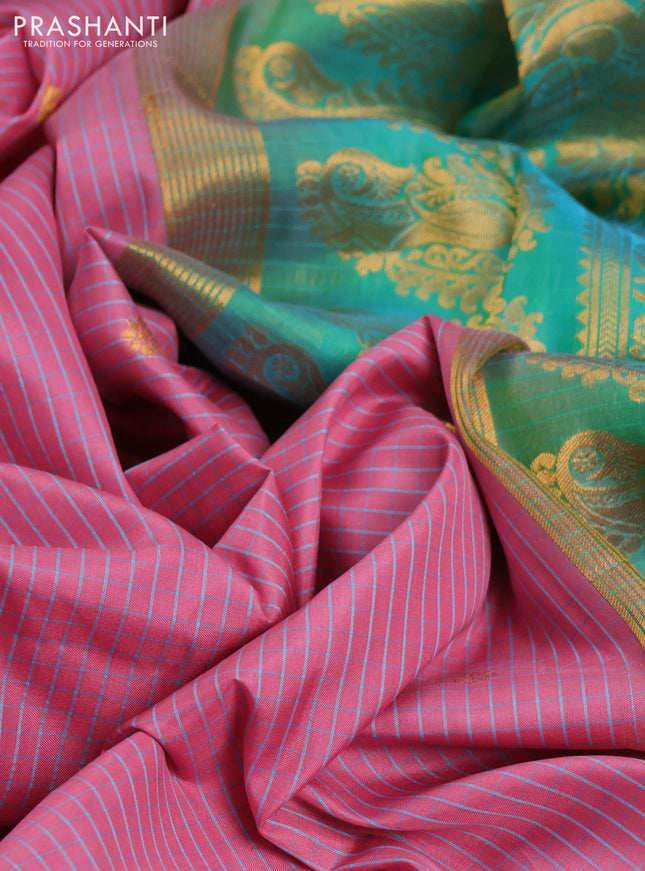 Pure gadwal silk saree peach pink shade and dual shade of teal bluish green with allover checks & zari buttas and temple design zari woven border