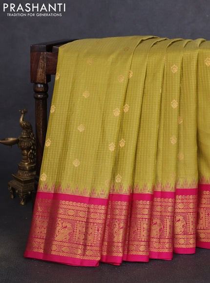 Pure gadwal silk saree mustard green and pink with allover zari checks & buttas and temple design zari woven border