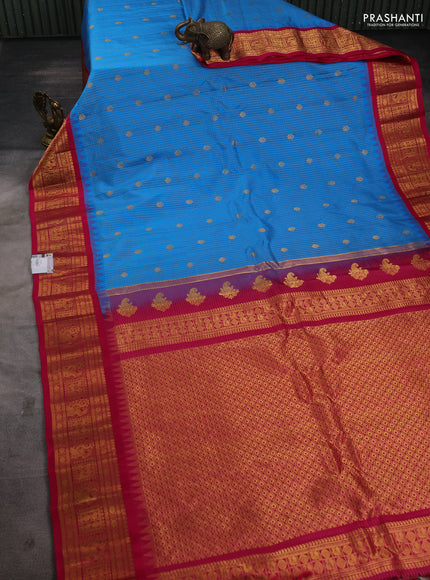 Pure gadwal silk saree cs blue and pink with allover zari checks & buttas and temple design zari woven border