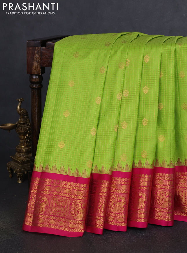 Pure gadwal silk saree light green and pink with allover zari checks & buttas and temple design zari woven border