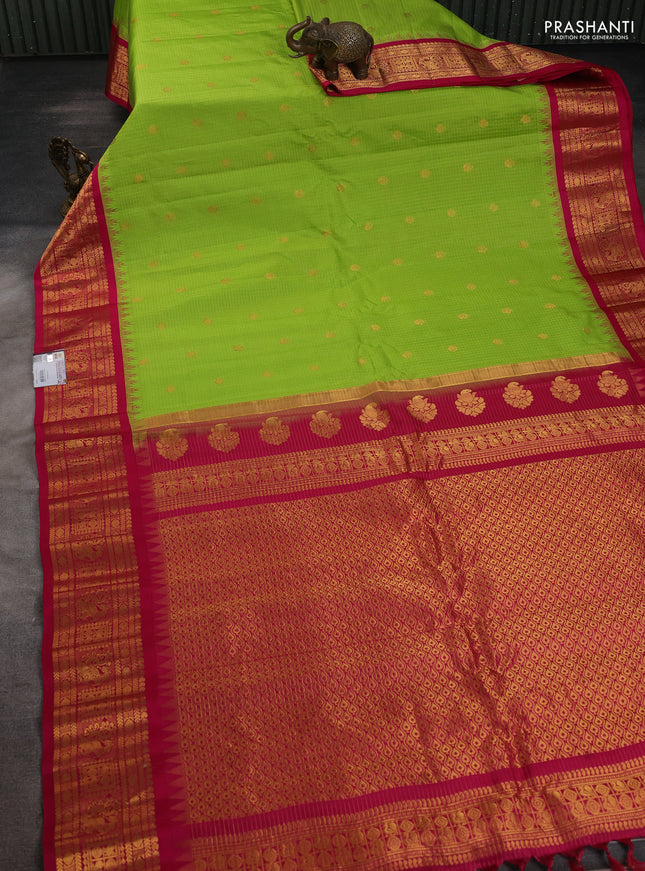 Pure gadwal silk saree light green and pink with allover zari checks & buttas and temple design zari woven border