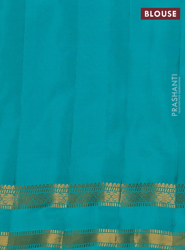 Pure gadwal silk saree dual shade of purple and teal green with allover zari checks & buttas and temple design rettapet zari woven border